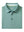 Folded Beryl Green Everyday Classic Solid Polo neatly laid out for display