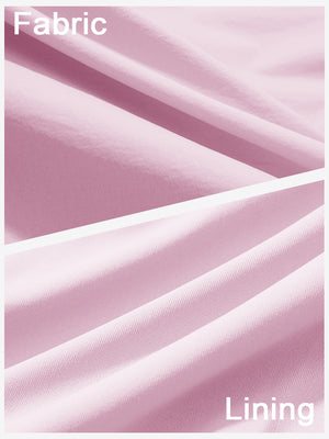 Close-up texture of light pink women's stretch a-line golf skort with 7 pockets fabric showing detailed outer and inner lining material.