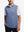 Upper body front view of model wearing navy melange lightweight sleeveless quarter zip golf vest