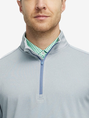 Front view from nose to chest of model wearing lunar rock melange moisture wicking quarter zip pullover