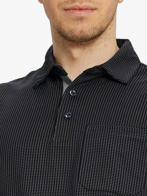 Model front view from nose to chest in BLACK Elegant Performance Jacquard Polo