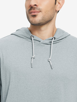 Close-up from nose to chest, showing soft heather texture and collar detail of the lunar rock melange hoodie.