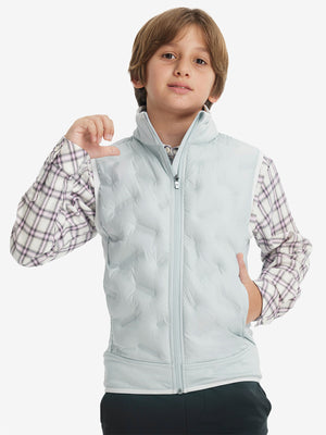 Model wearing boys full-zip fleece-lined puffer vest, hand in side pocket, relaxed fit in light grey
