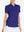 Front view from nose to hem of model wearing KLEIN BLUE Women's Performance Solid Polo with skirt