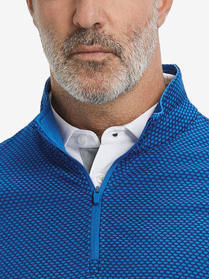 Close-up of collar area on jacquard quarter zip pullover in cobalt, highlighting refined jacquard detail.