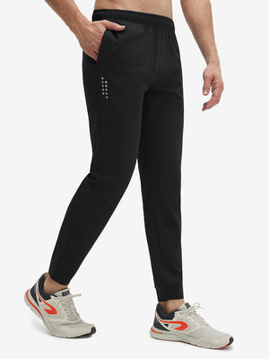 Front view of superion softness mesh joggers with zipper pockets in black