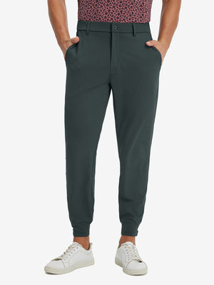 Model wearing Lightweight Ankle-Zip Sweatpants with 4 Pockets in dark grey, lower body front view