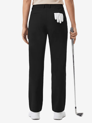 Back lower body shot of model wearing black women's regular fit stretchy golf pants