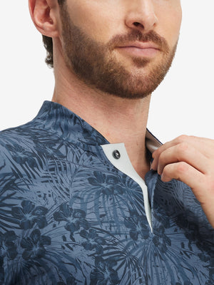 Close-up: nose to chest in dark blue plant stretch printed collarless henley golf shirts