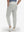 Front lower body shot of model wearing silver gray flat front golf joggers pants with belt loops