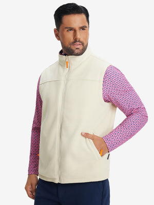 Model's front half-body shot with one hand in the pocket, wearing Beige Windproof Fleece Reversible Golf Vest.