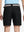 Back waist to knee view of black water resistant golf 7 inch shorts, flexible performance fit.
