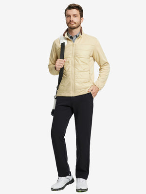 Full body model with bag, wearing water-resistant fleece lined pants in black outdoors