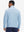 Back view showing fit of two tone pique cotton blend q-zip in light blue