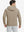 Back view of model wearing texture solid hoodies pullover showing fit and hood detail, light brown heather.