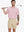 Half-body front view of model holding golf club wearing PINK WHISKEY GLASS Popular Heather Print Polo