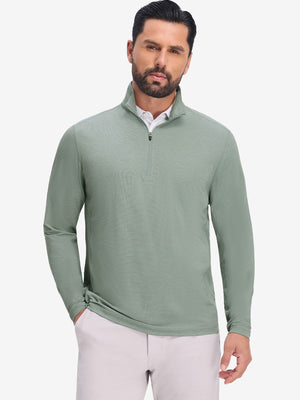 Front upper body shot of model wearing grey green featherweight midlayer quarter zip pullover