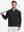 Full body model holding golf club in Premium jacquard quarter zip pullover, black style