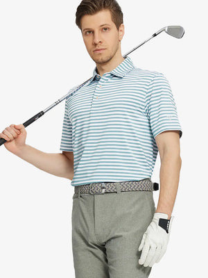 Front half-body shot holding golf club in Haze Blue White Yarn Dyed Stripe Polo – breezy and modern