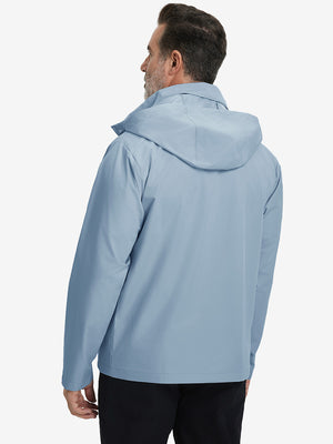Back view of model in lightweight water-repellent softshell hooded jacket showing fit and structure in slate blue.