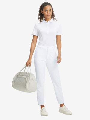 Woman wearing Women's Ultra-stretch Quick Dry Sweatpants with Ankle Zips in white, full body front view
