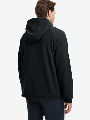 Back angle of the Polar Fleece Sweatshirt in Black, model turns head slightly for casual style.