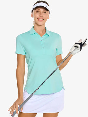 Front half-body of model in BLUE LIGHT Women's Performance Solid Polo holding golf club