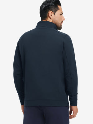 Back upper-body view of water-resistant zip up golf jacket on model, shown in navy.