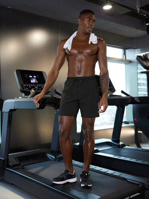 Full-body gym view of model in BLACK 2 in 1 Running Sports Shorts with Liner