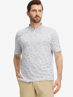 Front half-body of model in brown grey camo stretch printed collarless henley golf shirts