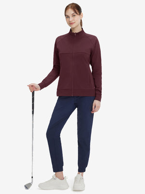 Women's Water-Resistant Stretch Fleece Lined Jacket in wine, model holding golf club 