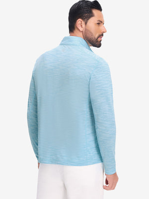 Back upper body shot of model wearing misty blue featherweight midlayer quarter zip pullover