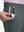 Detail view of front pocket on dark gray breathable casual slacks with 4 pockets