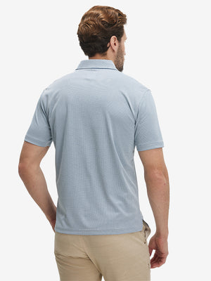 Back waist-up shot of model wearing white light blue grid ultra-light quick dry moisture wicking collared polo shirt