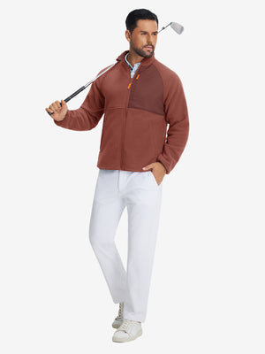 Full-body shot of the model wearing the reversible fleece jacket with 5 pockets in maroon.