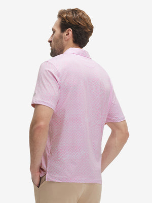 Back upper body view of model in Performance quick dry print golf polos with subtle white pink floral tone