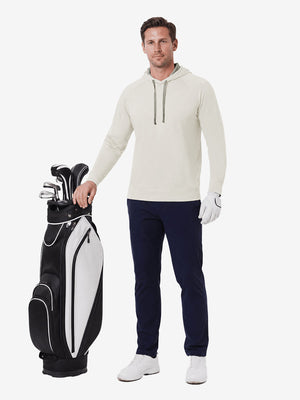Full body model holding golf gear outdoors, heather midlayer golf hoodies in light khaki heather