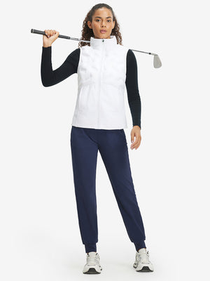 Model holding golf club full body, women's lightweight slim-fit puffer vest styled in sporty white