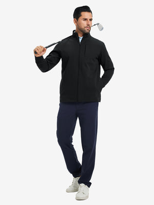 Model holding a golf club, wearing black water-resistant zip up golf jacket in full-body view.