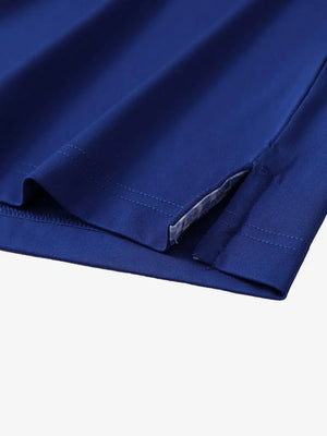Close-up of side slit detail on the Klein Blue Everyday Classic Solid Polo hem