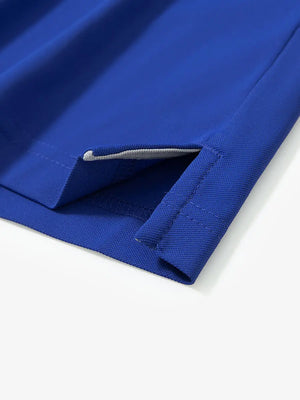 Detail shot of hem opening on COBALT Ventilated Pique Performance Polo