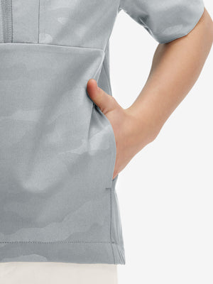 Detail shot of pocket on light grey water-resistant short sleeve q-zip hoodie for boys