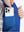 Close-up of boys full-zip fleece-lined puffer vest pocket holding a phone, practical detail in klein blue