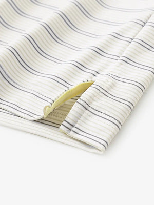 Close-up of side hem slit on Khaki Neutral Grey Stripe Performance Stripe Golf Shirt