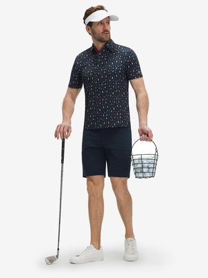 Full-body front view of model wearing the colorful sailboat 4 way stretch print collared polo shirt, showing the complete outfit