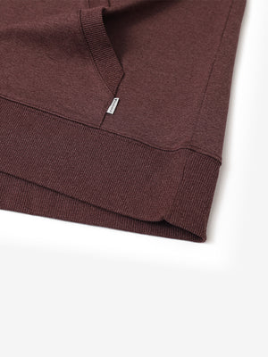 Hem detail of the Brick Heather Athletic Golf Hoodie, highlighting clean stitching and neat design.