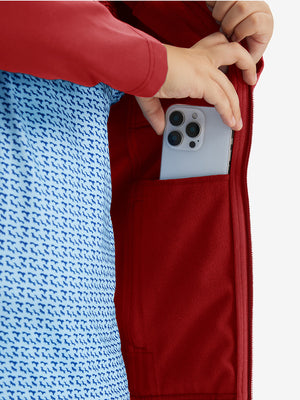 Close-up of the front side pocket detail on kids soft lightweight fleece lined jacket in red, showing quality stitching.