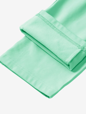 Boys Stretch Fleece Lined Casual Golf Pants in turquoise, flat lay showing fleece lining