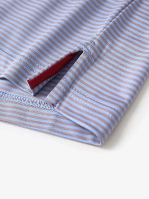 Detailed view of side hem slit on Cooling Stripe Golf Shirt in BLUISHYELLOW STRIPE, showing comfort and design