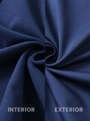 Close-up fabric detail of women's lightweight slim-fit puffer vest, smooth texture and navy finish